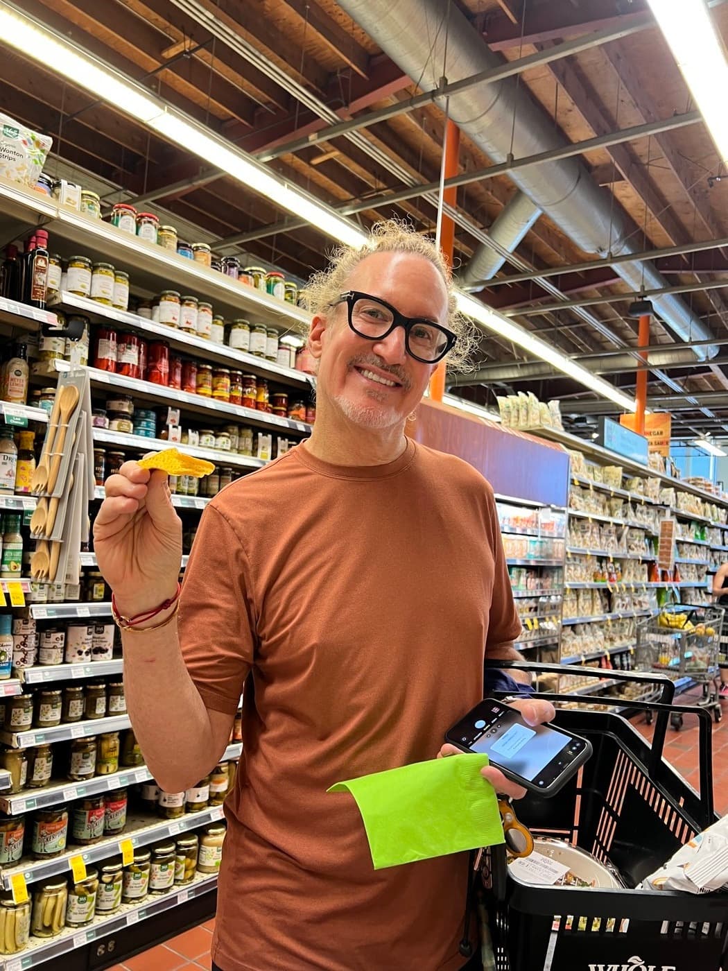 Shopper tasting Tango at Whole Foods